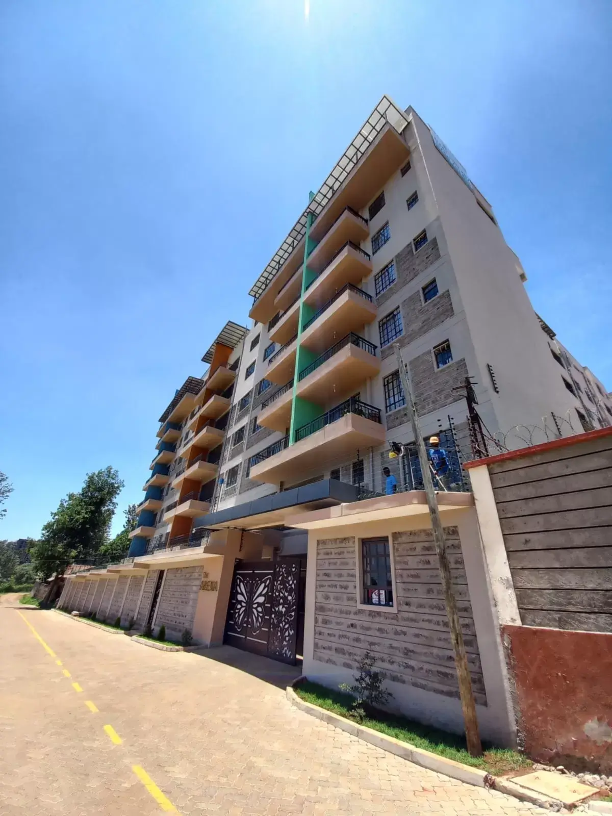 Modern multi-story residential building facade with balconies