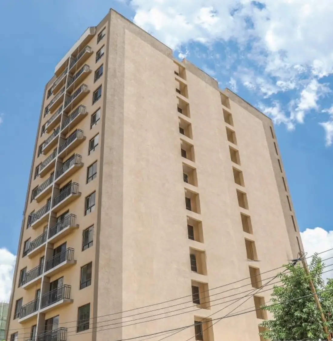 Multi-story residential building facade with balconies