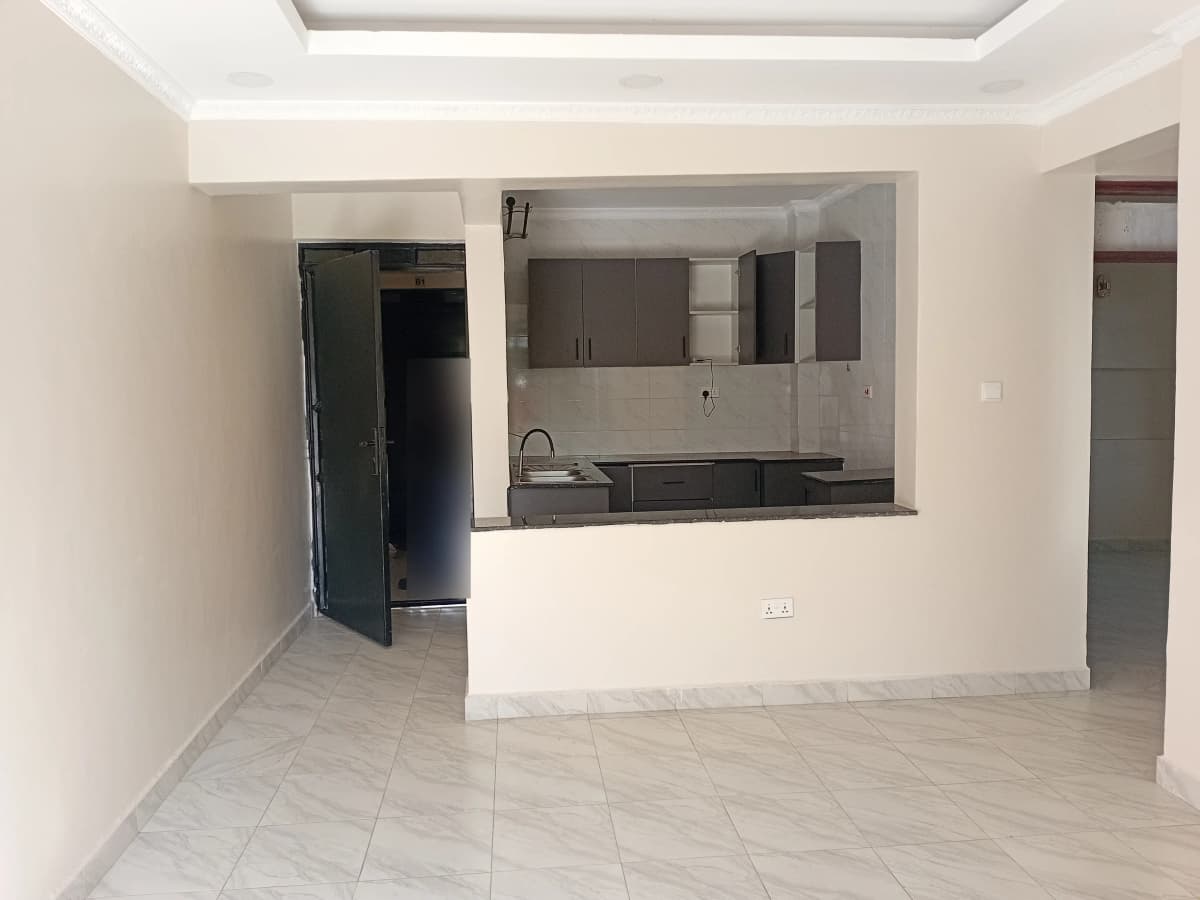 Open-plan living area with integrated kitchen counter