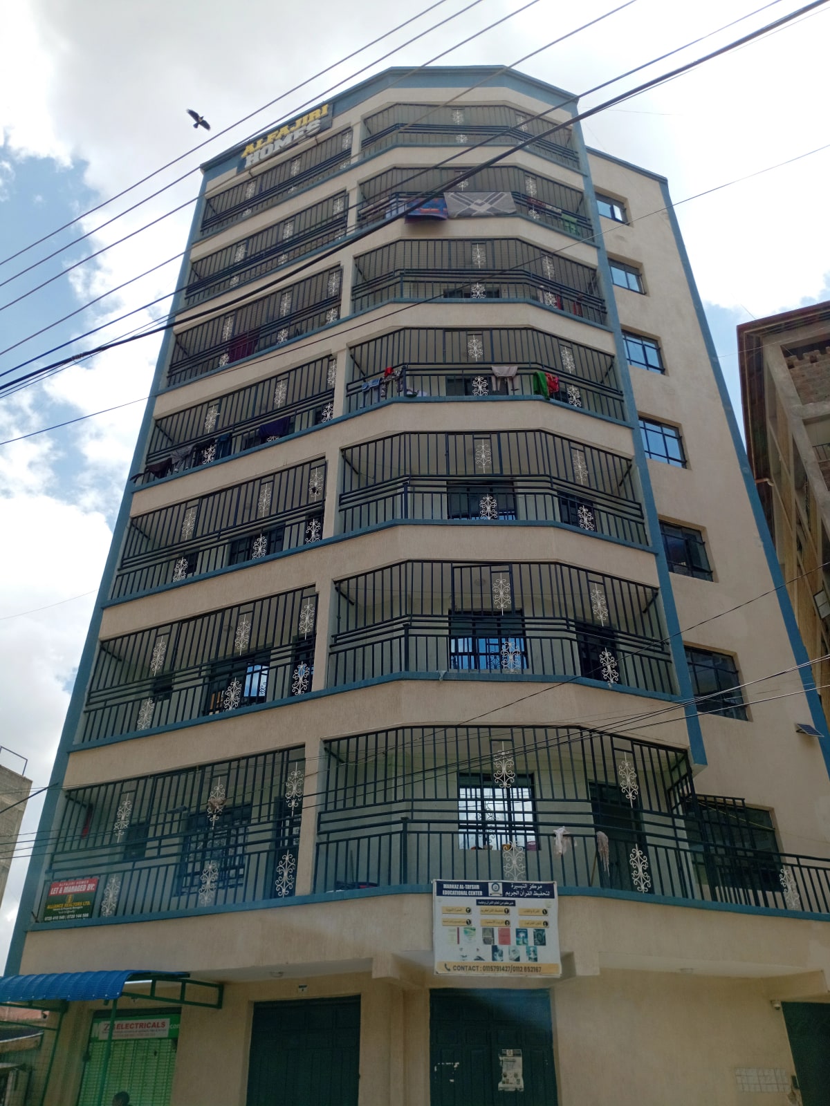 Multi-story residential building facade with balconies