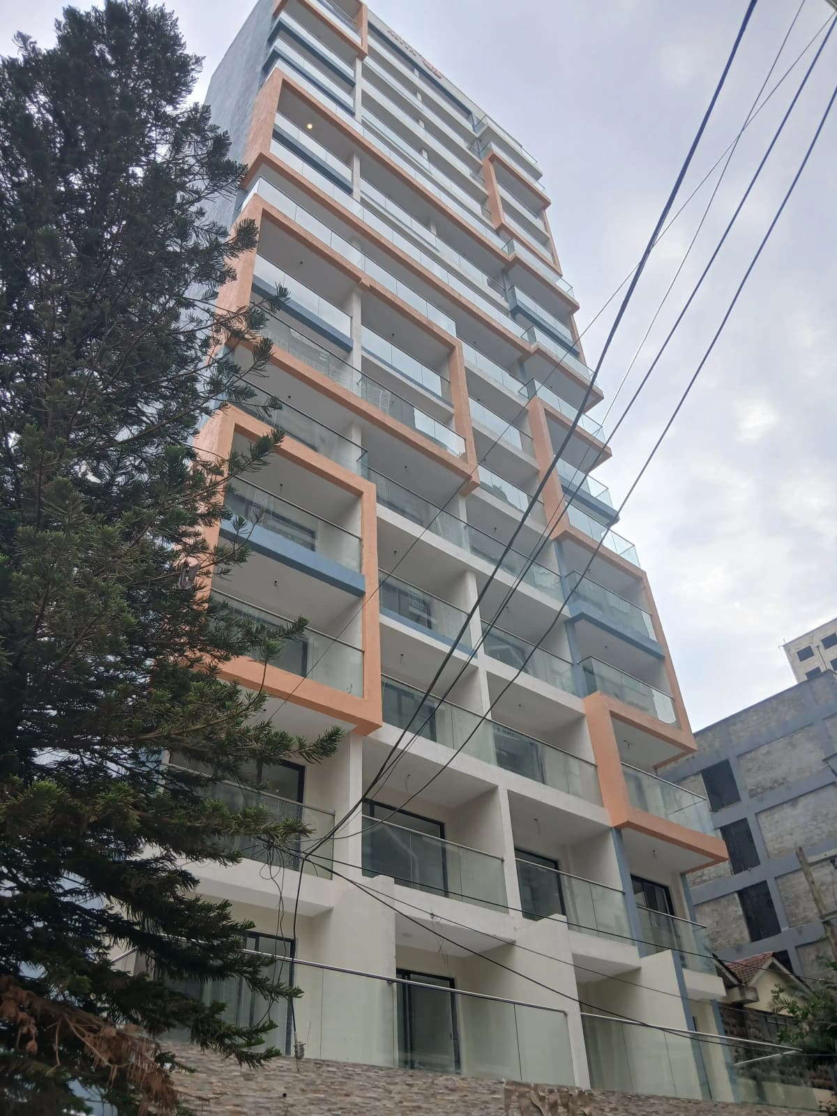 Modern multi-storey apartment building facade with balconies
