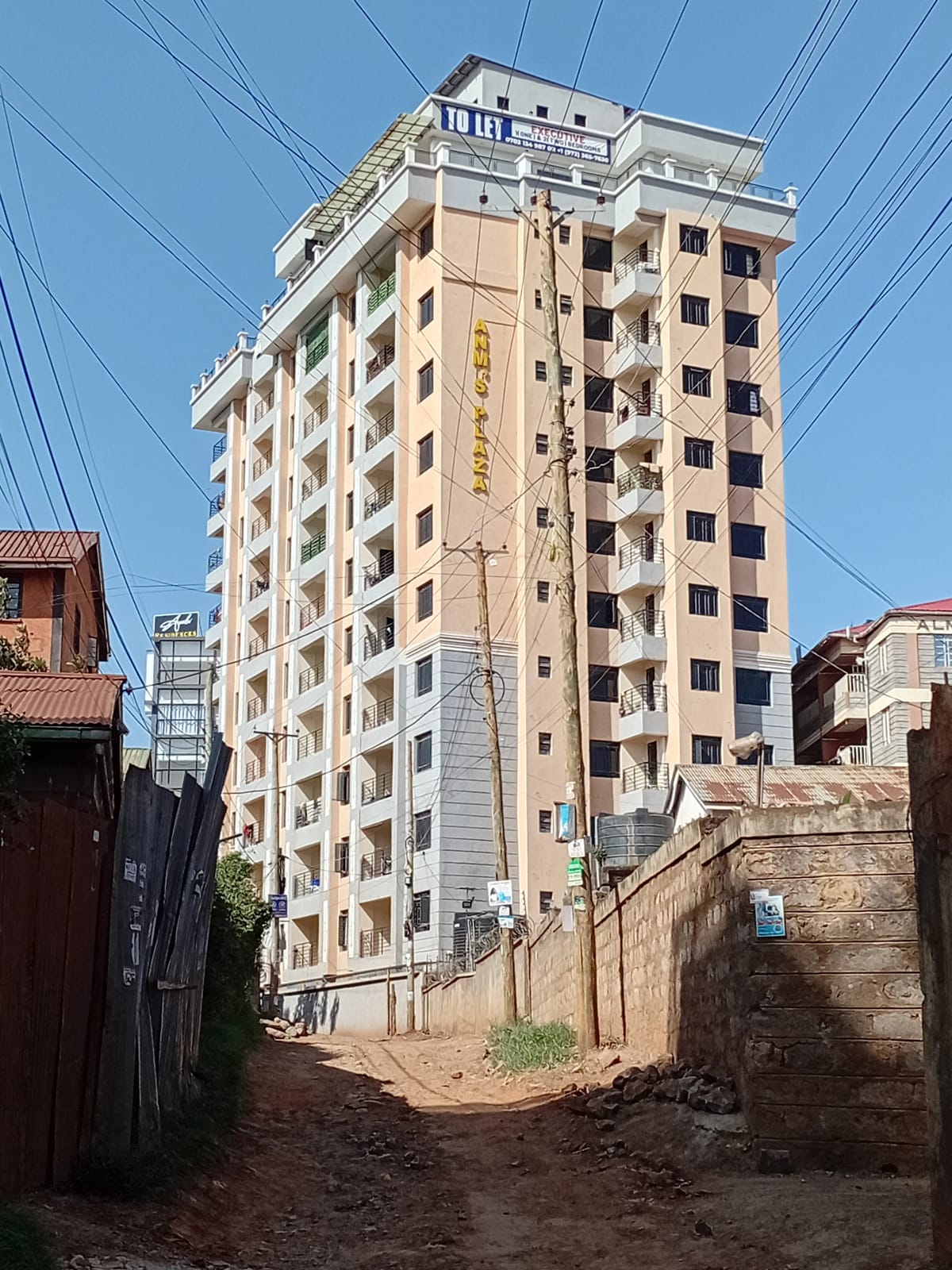 Multi-story residential building facade with balconies