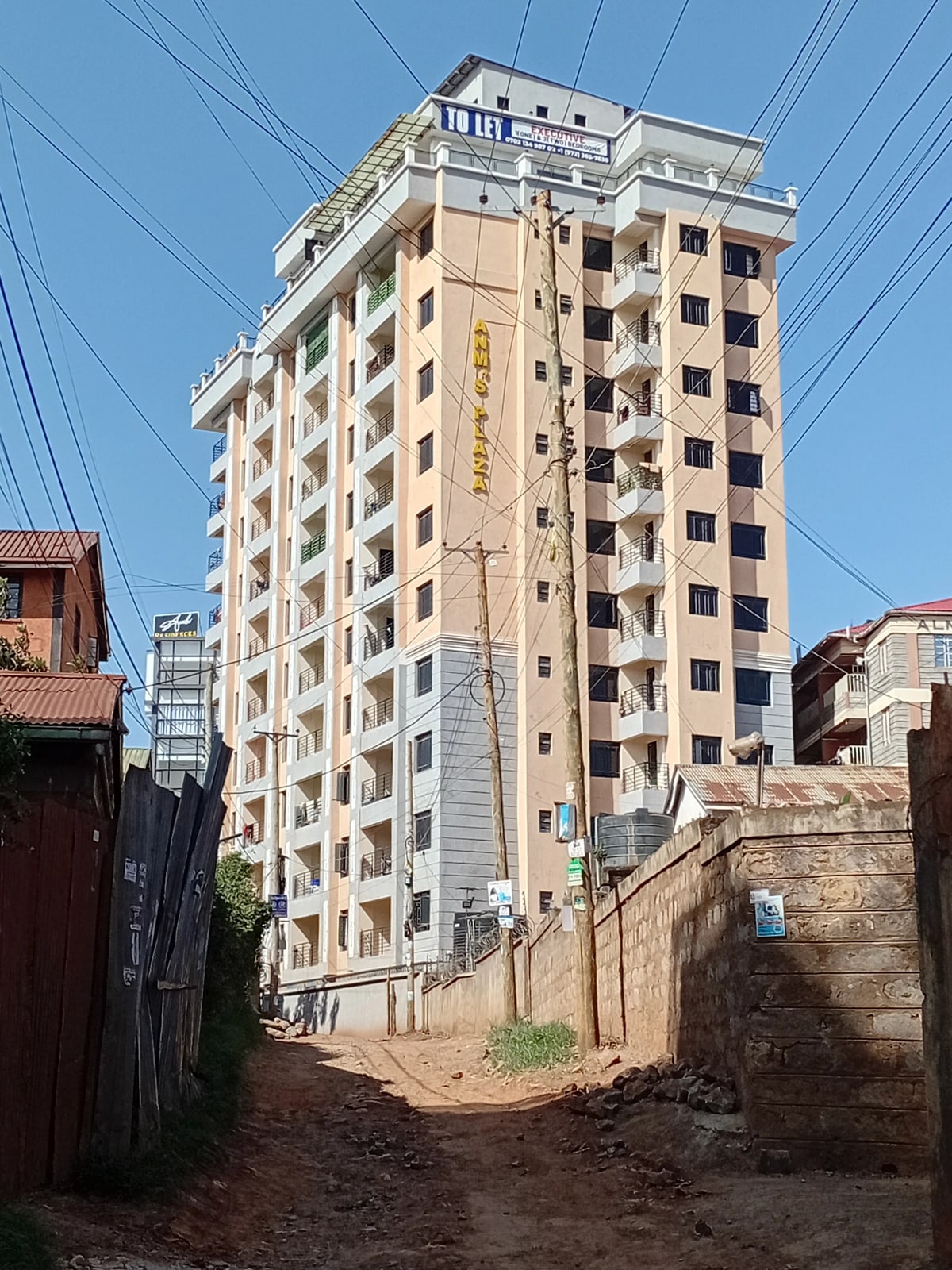 Multi-story residential building facade with balconies