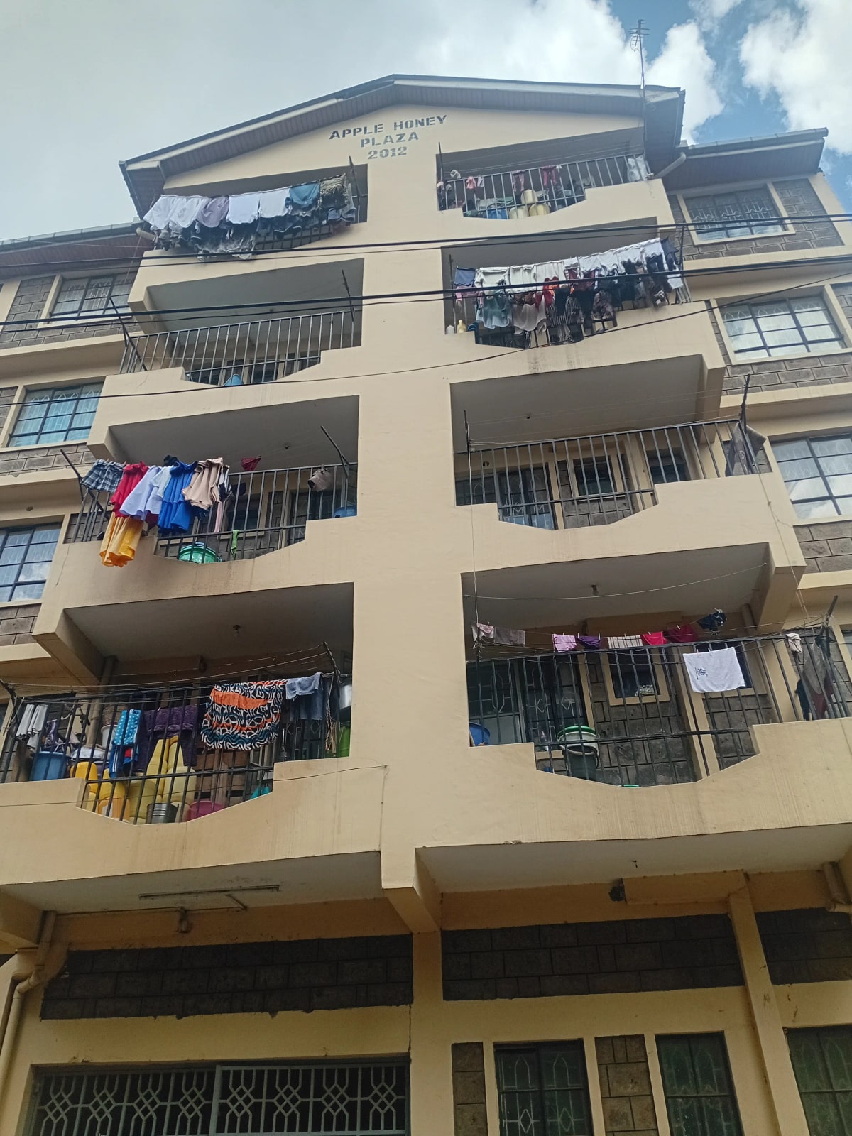 Multi-story residential building facade with balconies