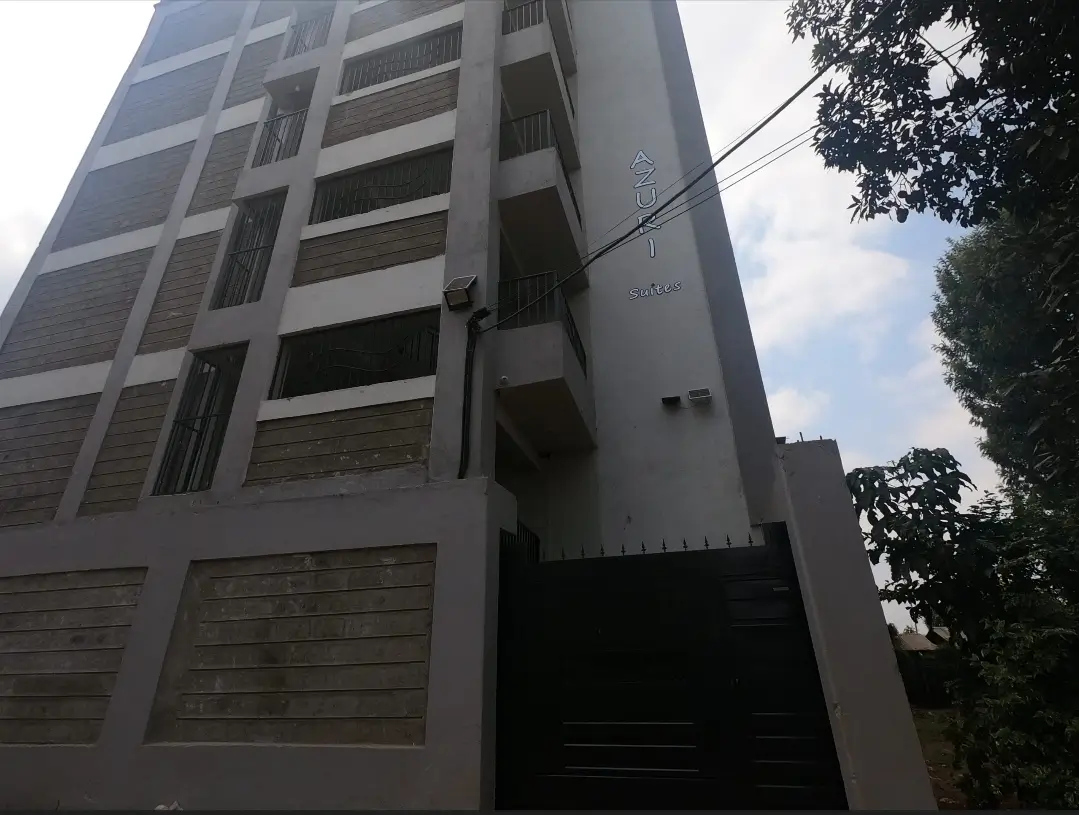 Multi-story residential building facade with modern design