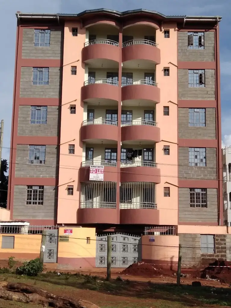 Multi-story residential apartment building with curved balconies