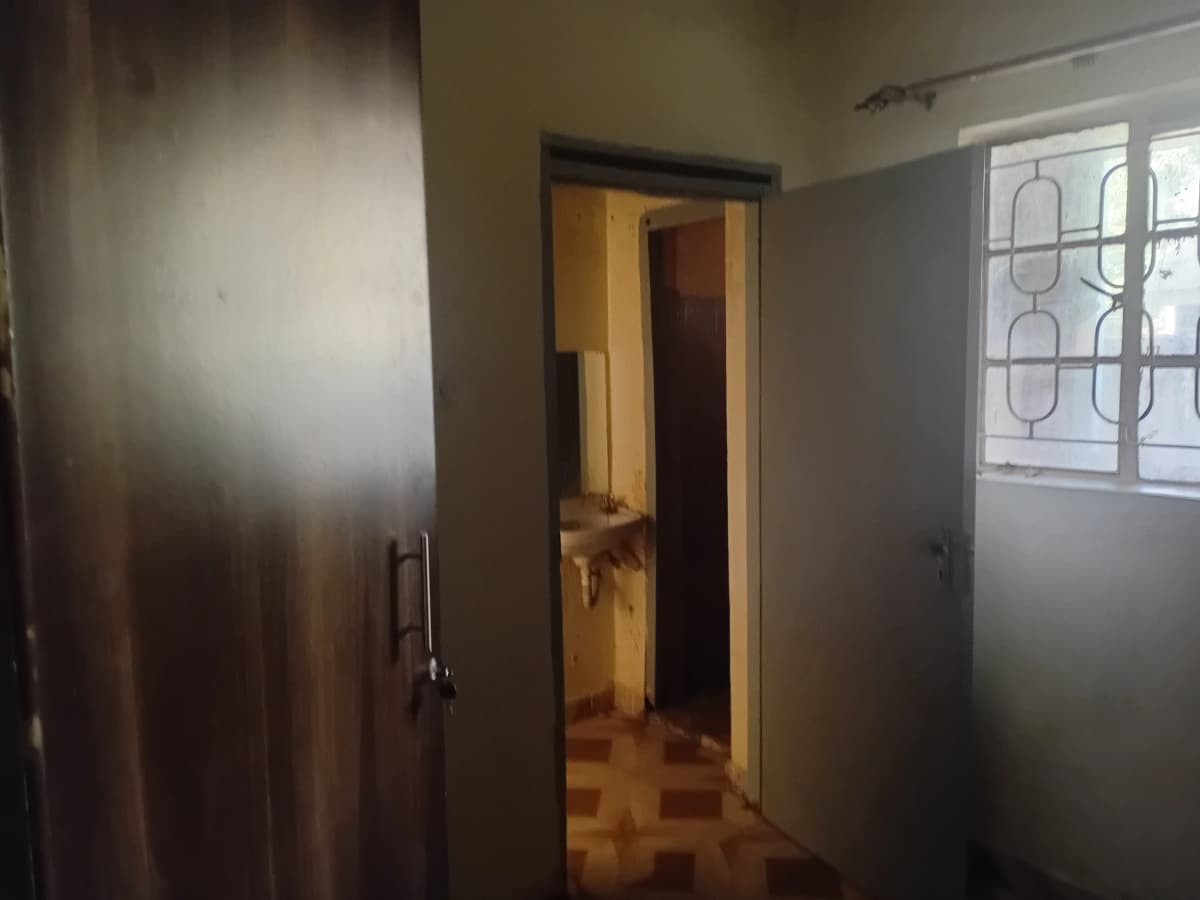 Building corridor with multiple doors and frosted glass panels