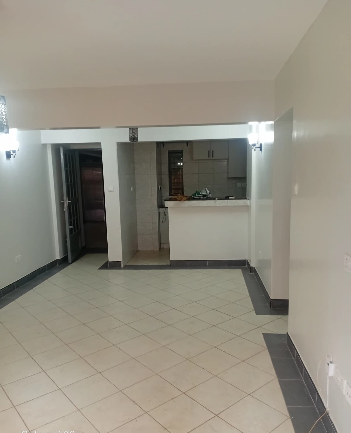 Open-plan living area with pass-through kitchen counter