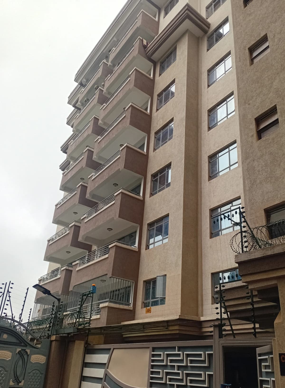 Multi-story residential building facade with balconies