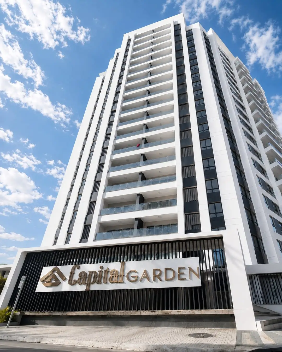 Modern multi-story residential building facade with balconies