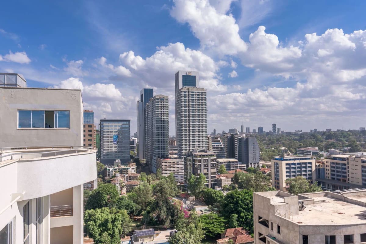 Cityscape view from high-rise apartment overlooking downtown skyline