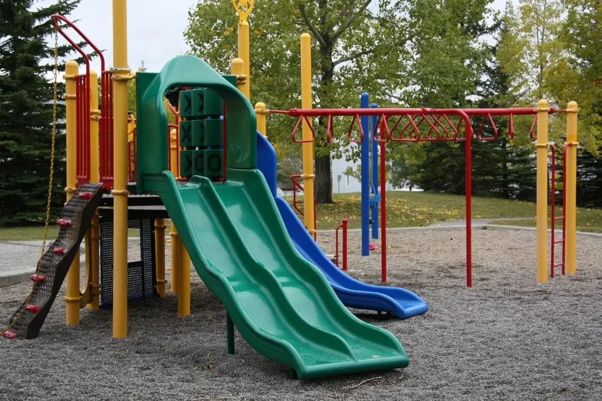 Colorful children's playground with slides and climbing structures
