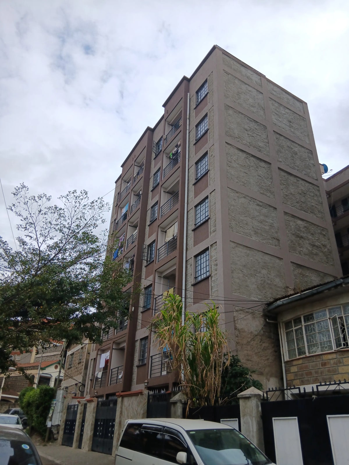 Multi-story residential apartment building with concrete facade