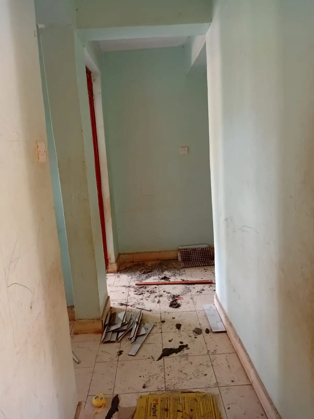 Hallway or corridor under construction with debris