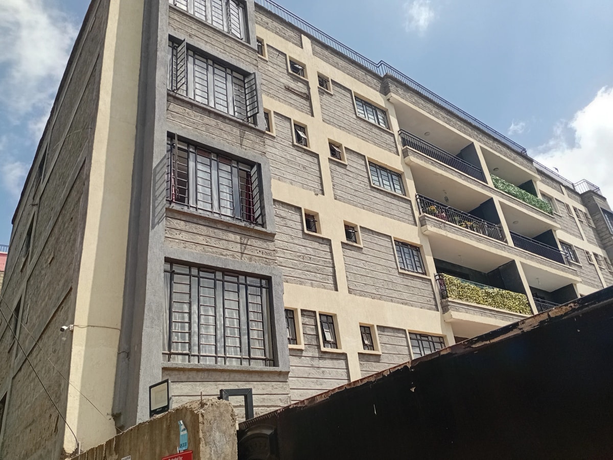 Multi-story residential building facade with balconies