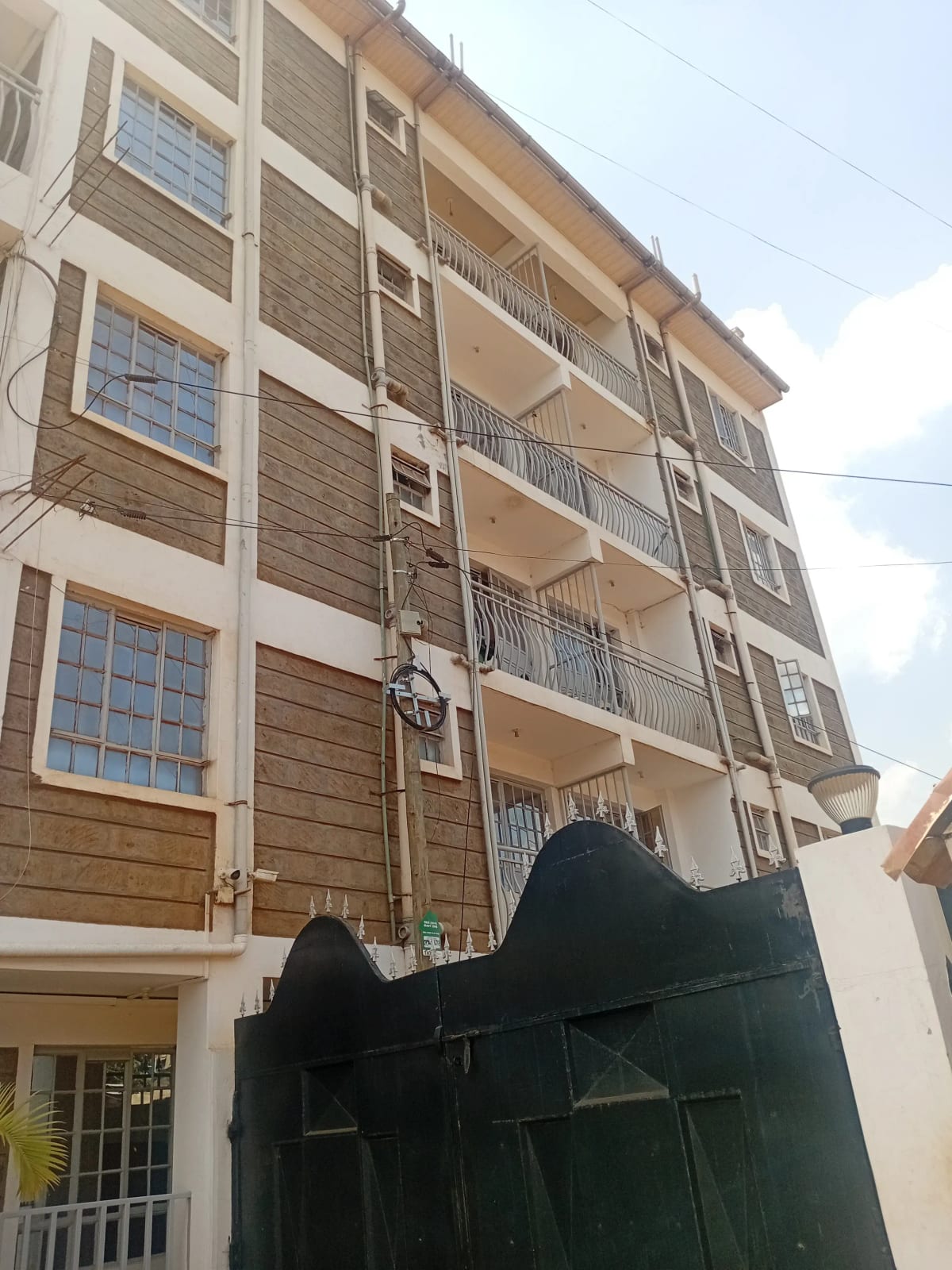 Multi-story residential building facade with balconies