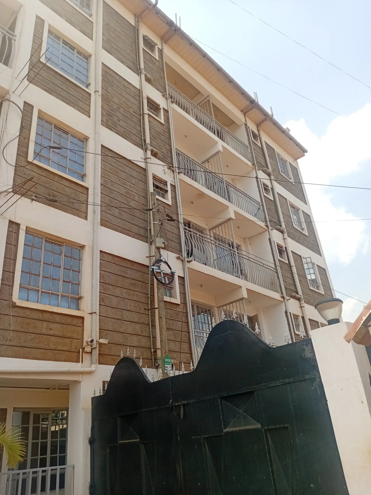 Multi-story residential building facade with balconies