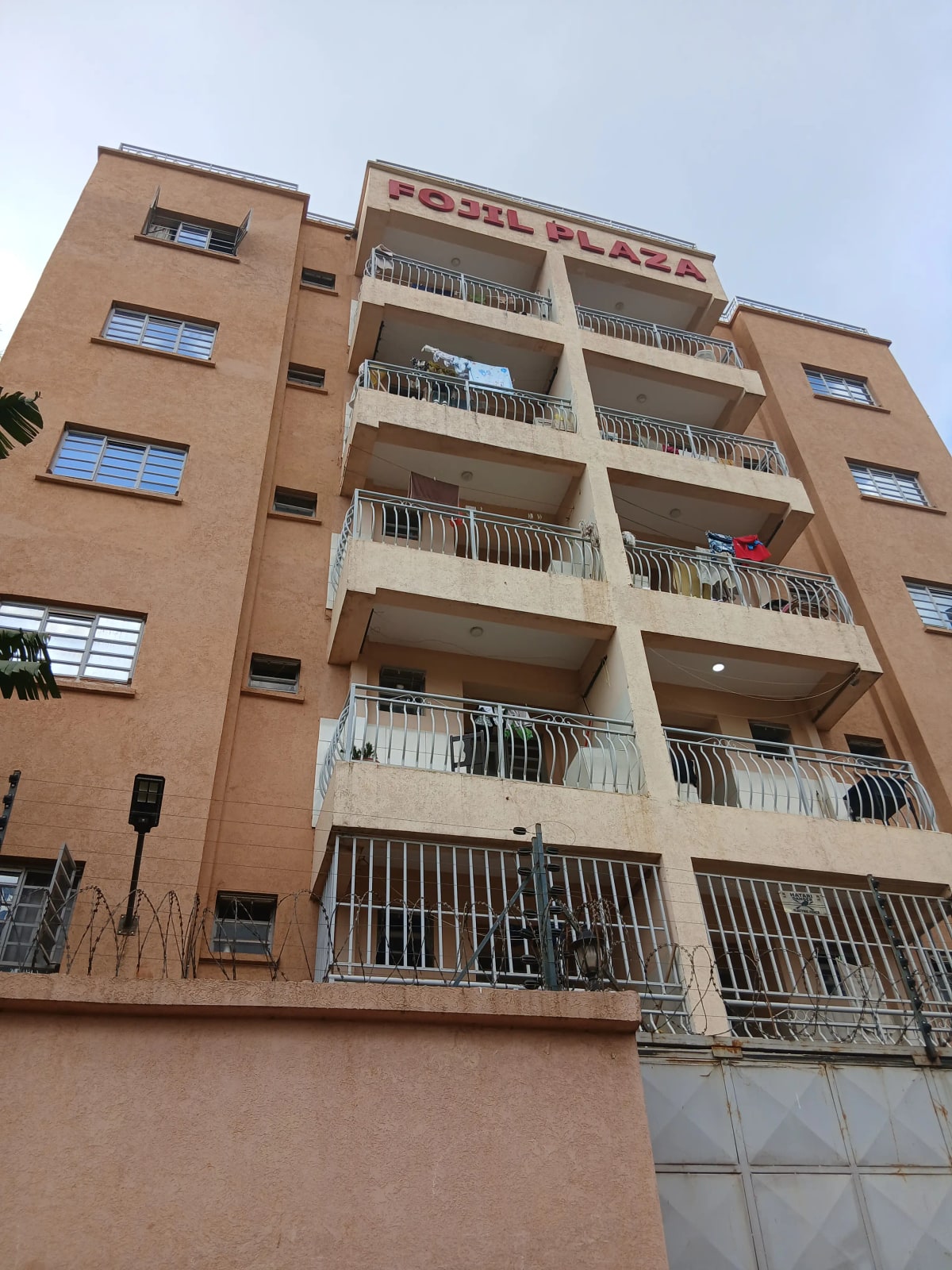 Multi-story residential building facade with balconies
