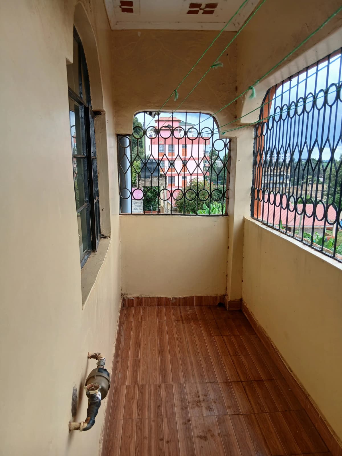 Closed balcony space with hanging lines