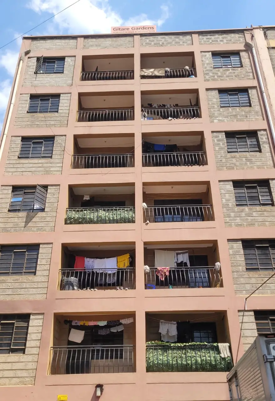Multi-story residential building facade with balconies