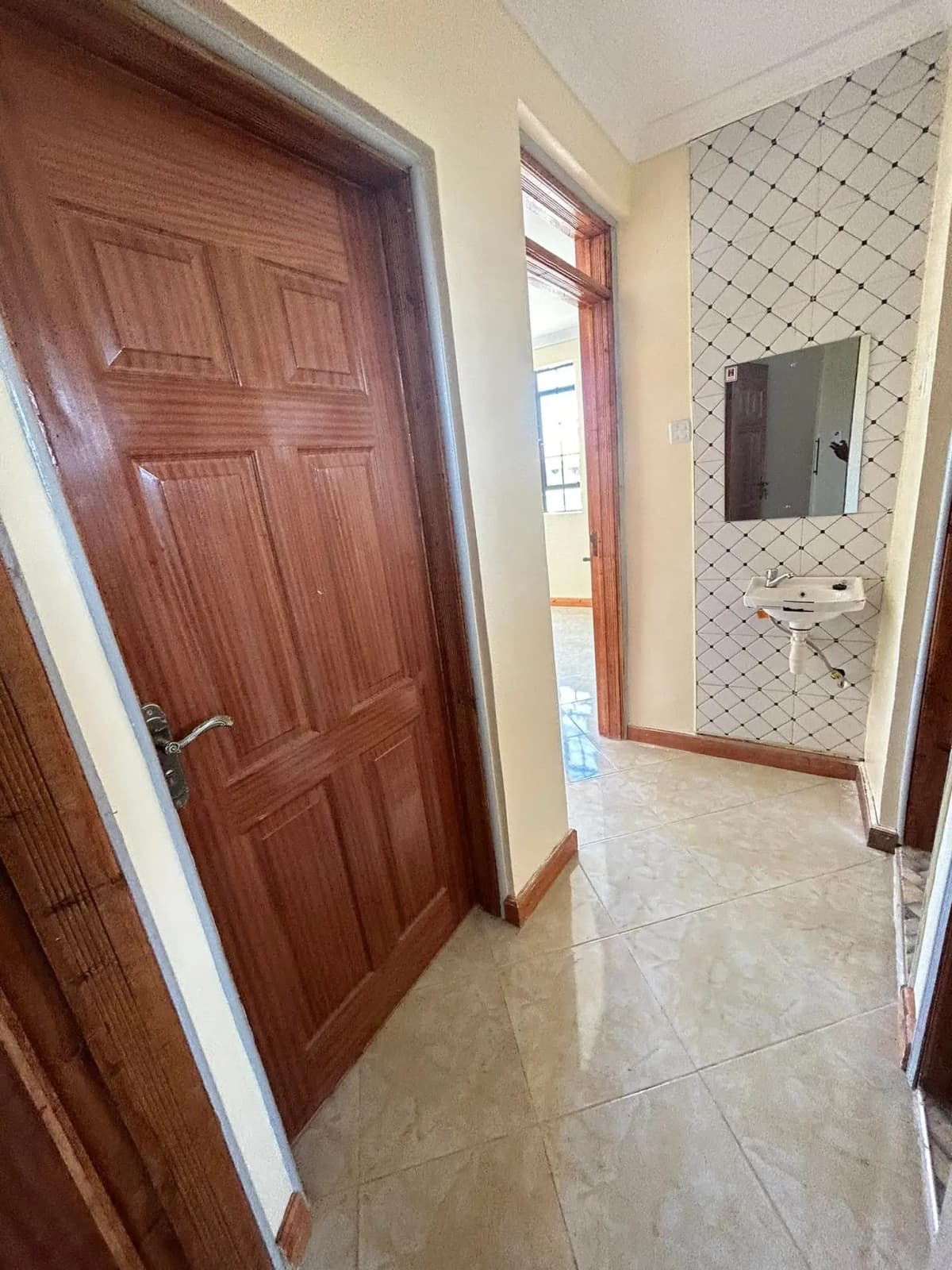 Modern bathroom with tiled walls and contemporary fixtures