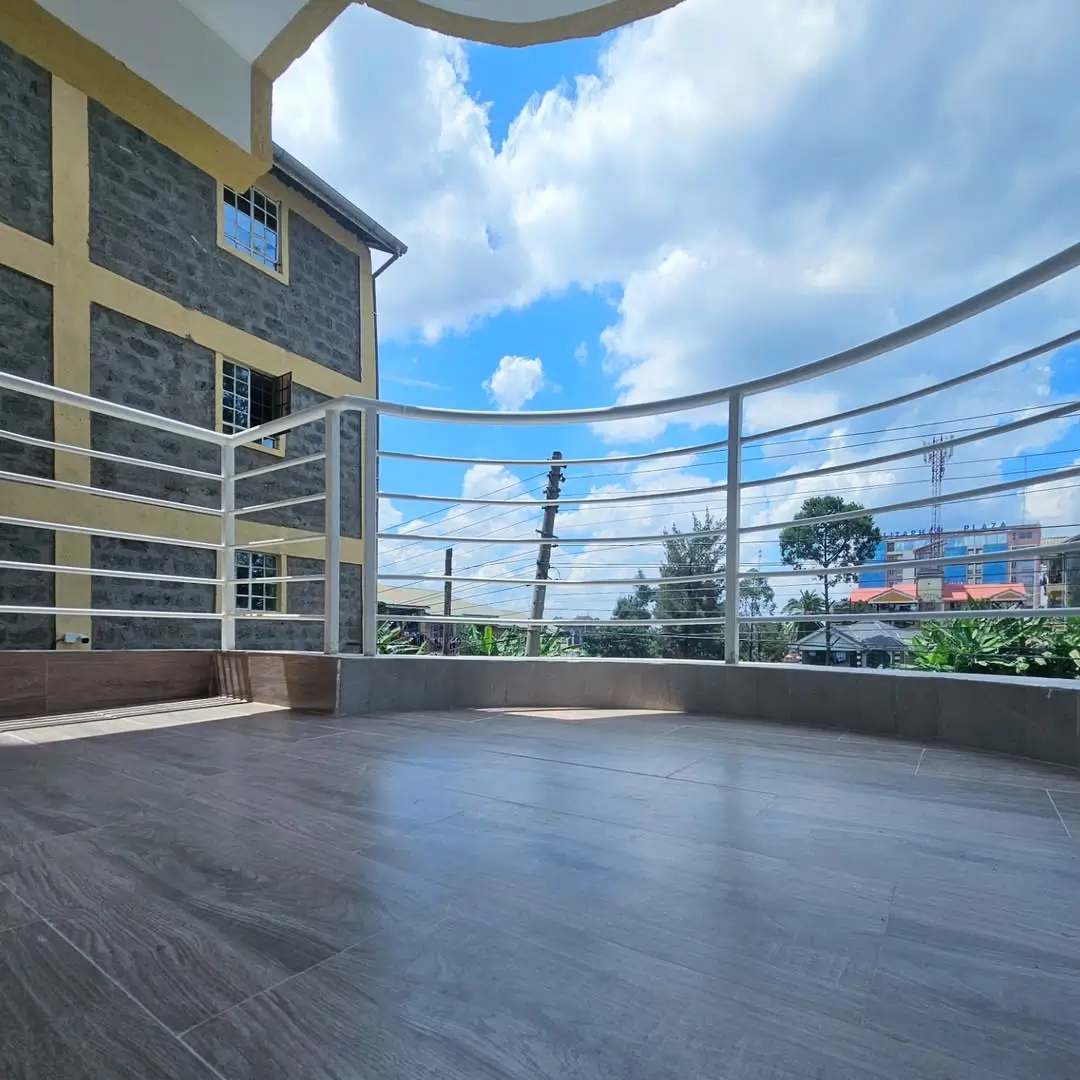 Spacious rooftop terrace with panoramic city and landscape views