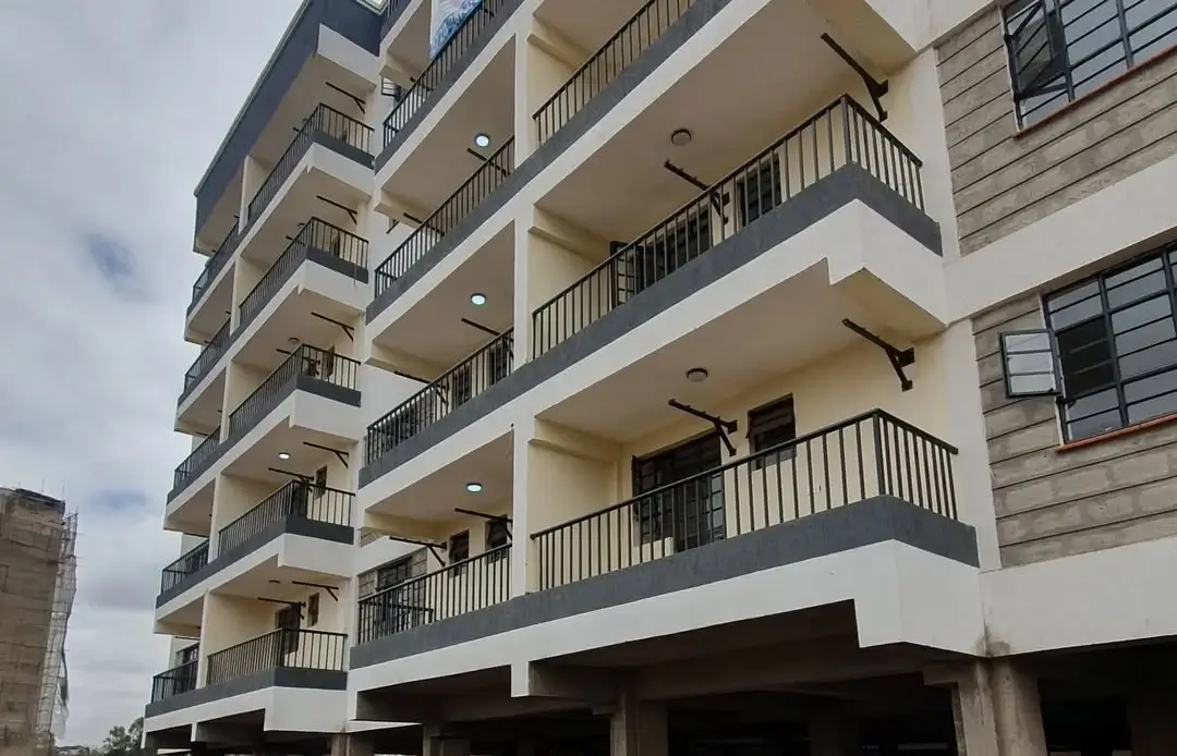 Modern apartment building facade with multiple balconies