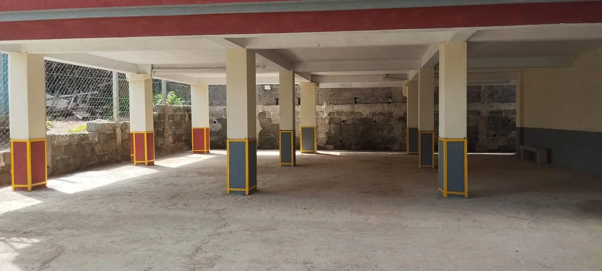 Large covered parking with columns and natural light entry