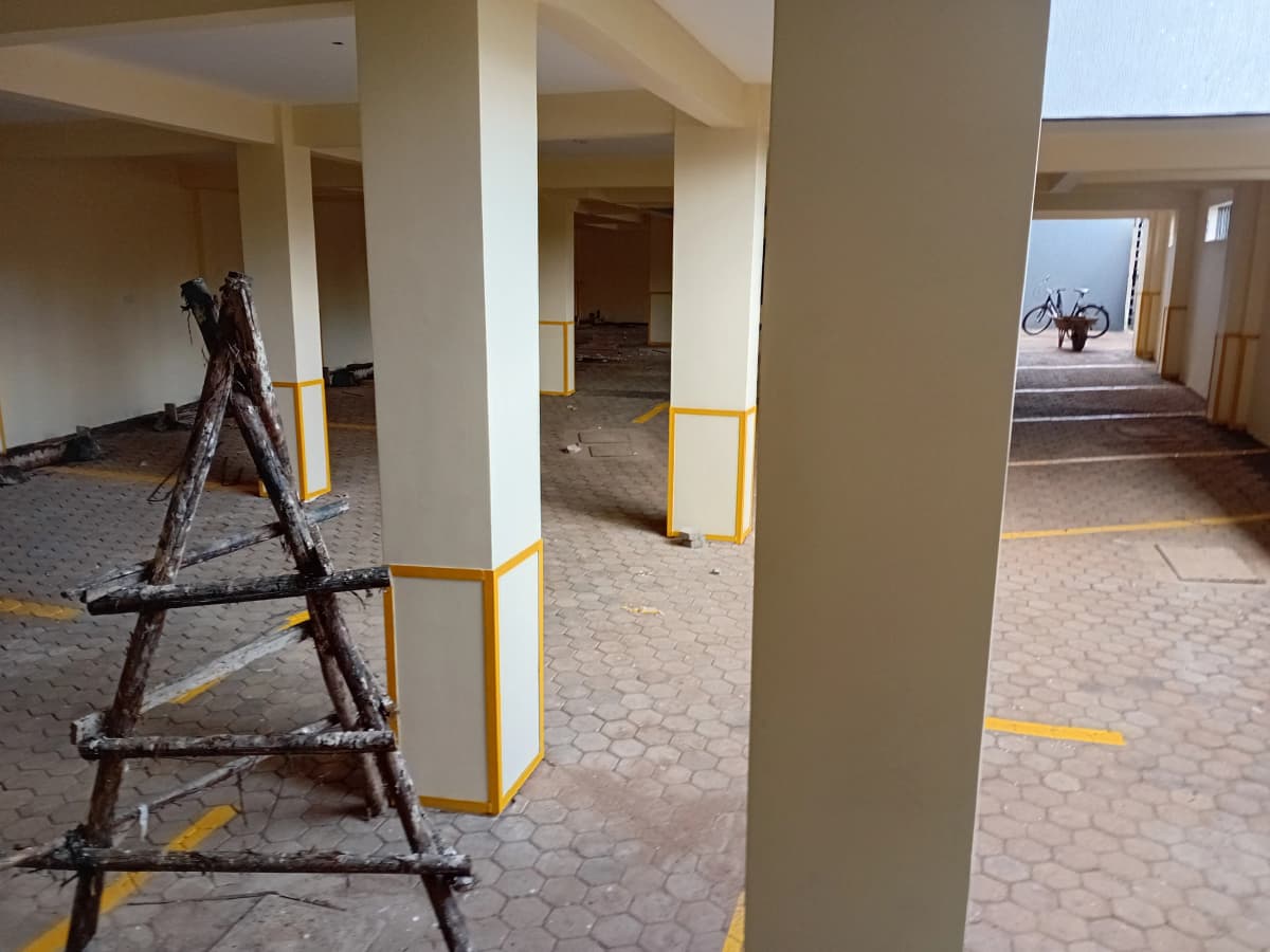 Large open lobby under construction with support columns