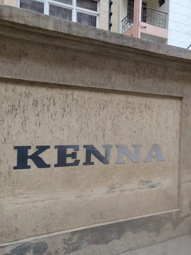 Building exterior wall with KENNA property signage