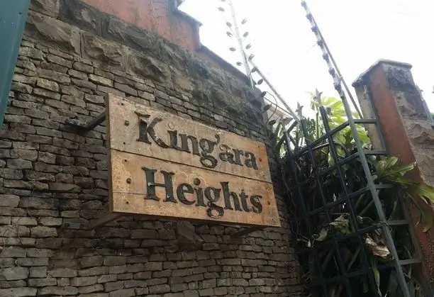 Kingara Heights building entrance sign on brick wall
