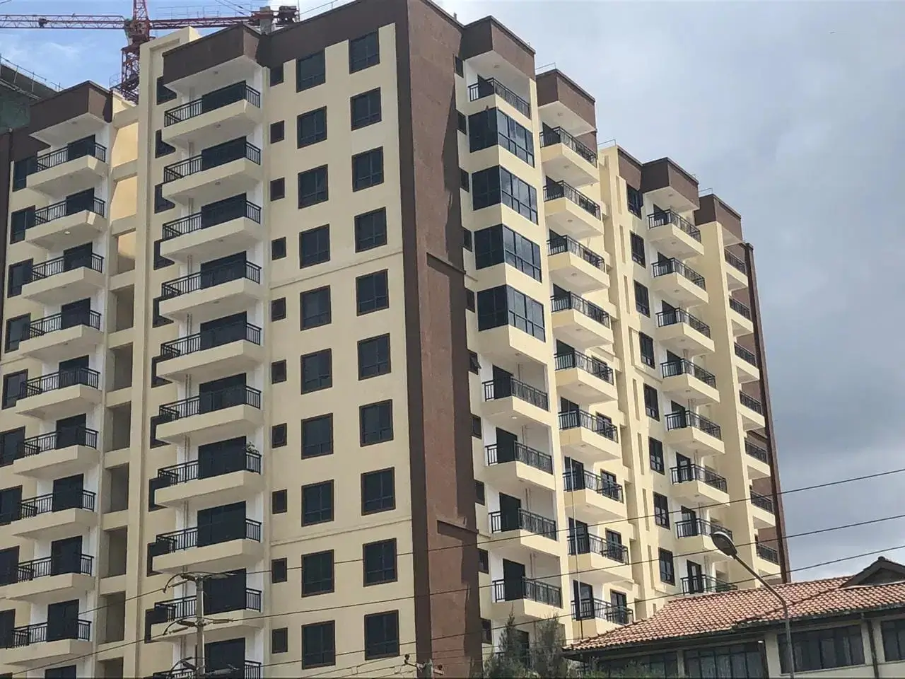 Multi-story residential building facade with balconies