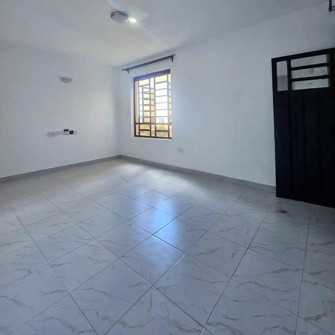 Living Room with marble floor tiles and barred window