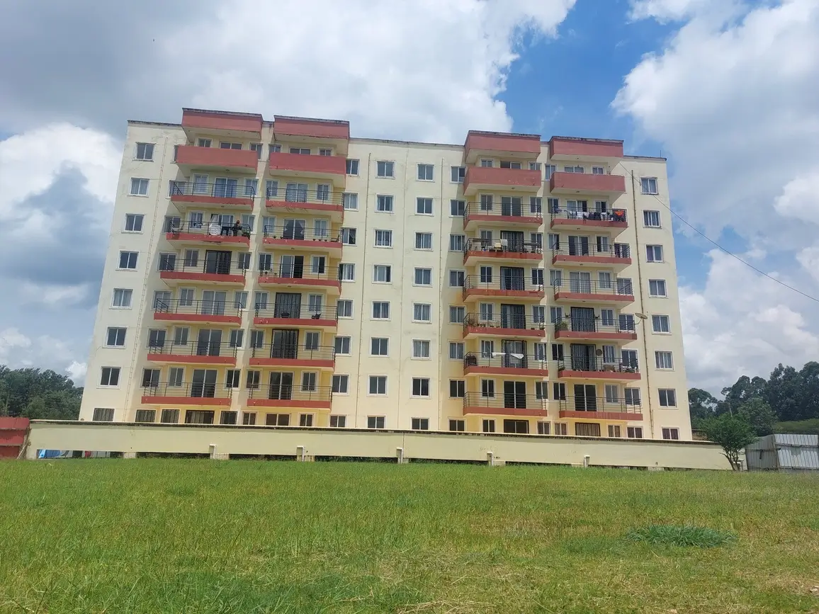 Multi-story residential apartment building with colorful facade