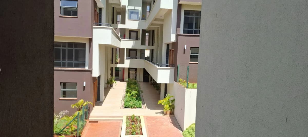 Compound courtyard with landscaped garden and walkway