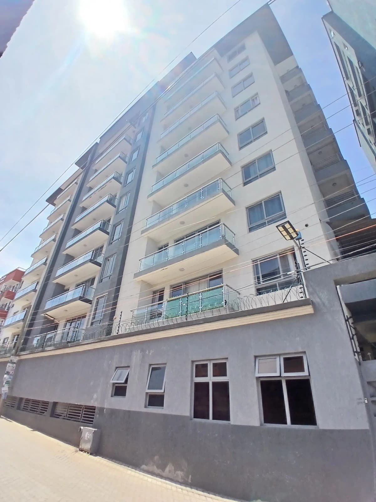 Multi-story residential building facade with balconies