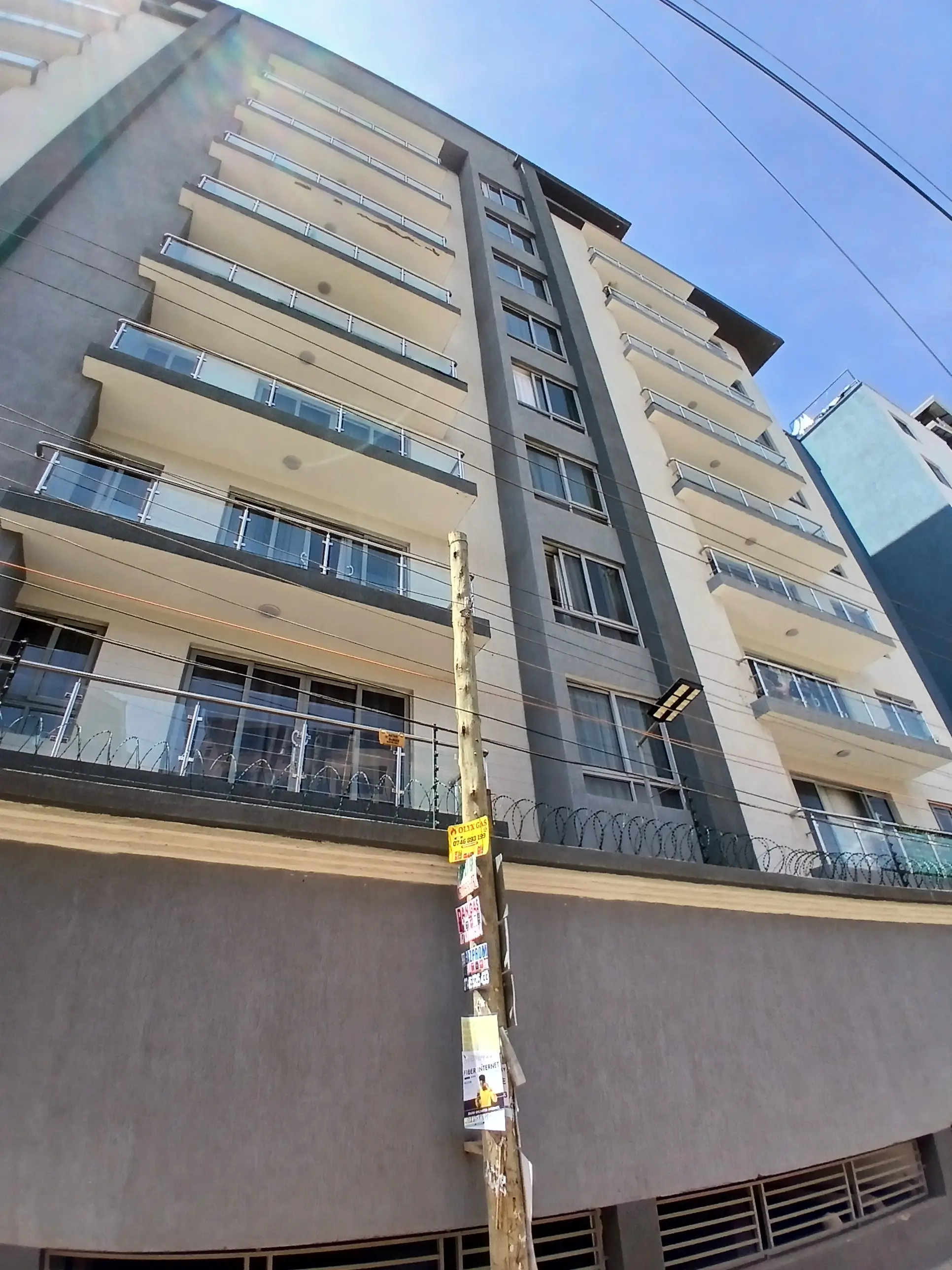 Multi-story residential building facade with balconies