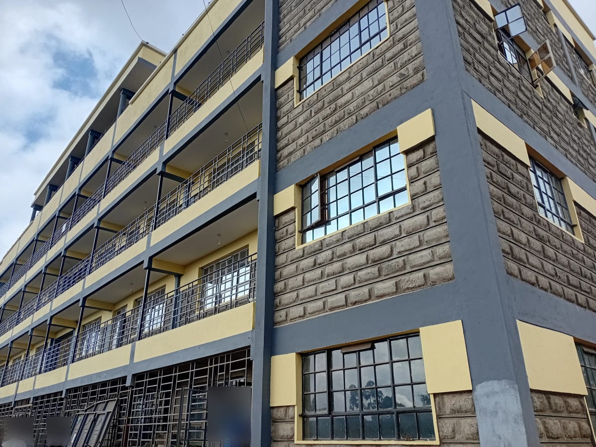 Modern multi-story residential building facade with balconies