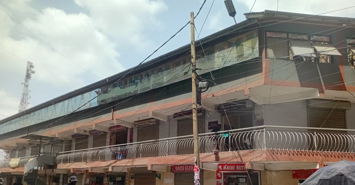 Multi-story residential building with commercial ground floor