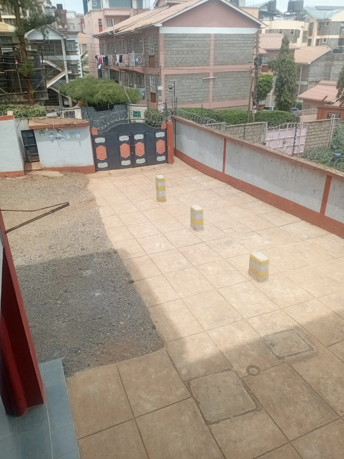 Rooftop terrace with tiled flooring and city views