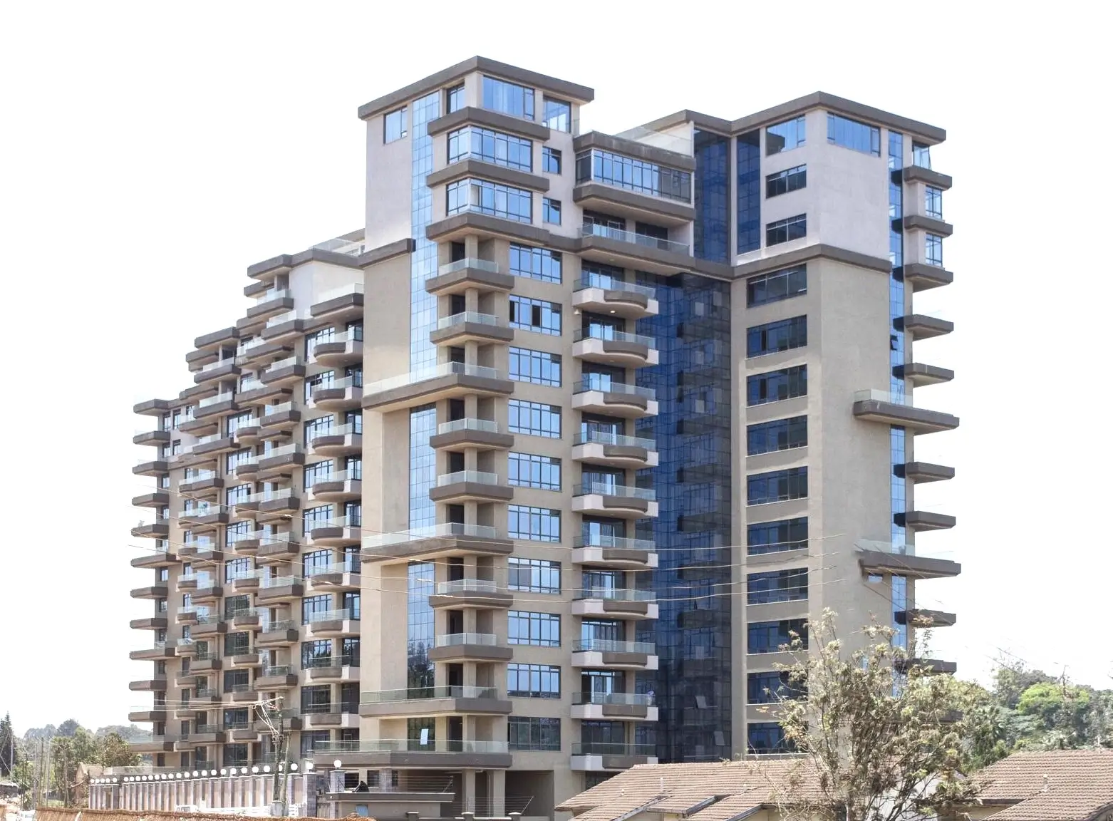 Modern multi-story residential building with balconies and contemporary facade