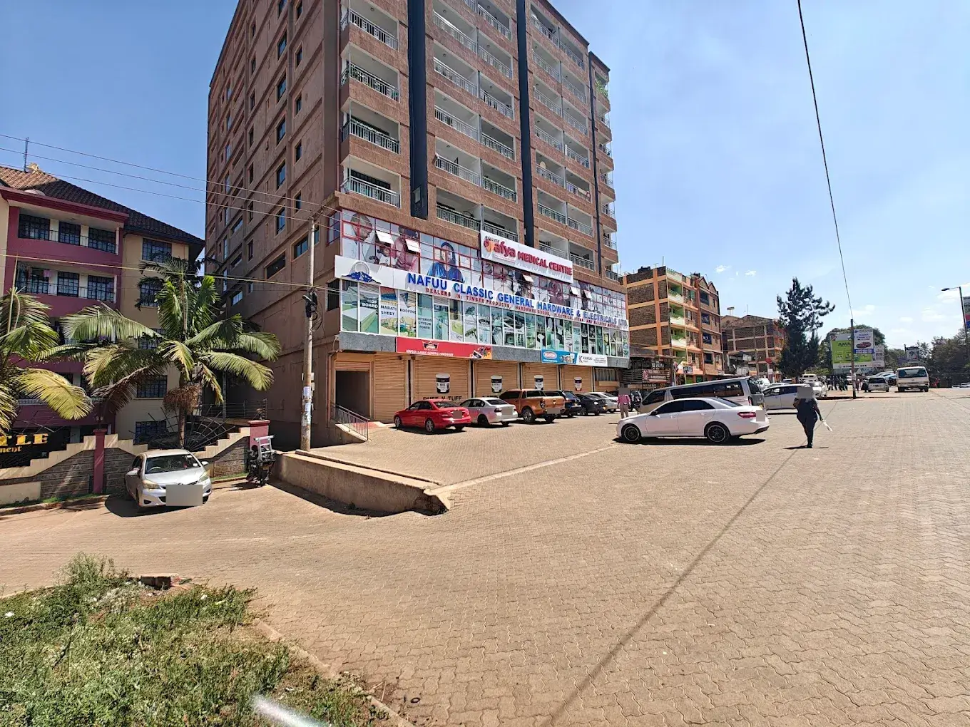 Multi-story residential building with ground-level parking area