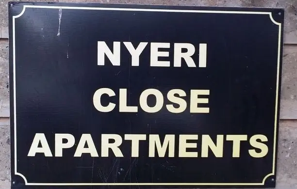 Property signage for Nyeri Close Apartments building