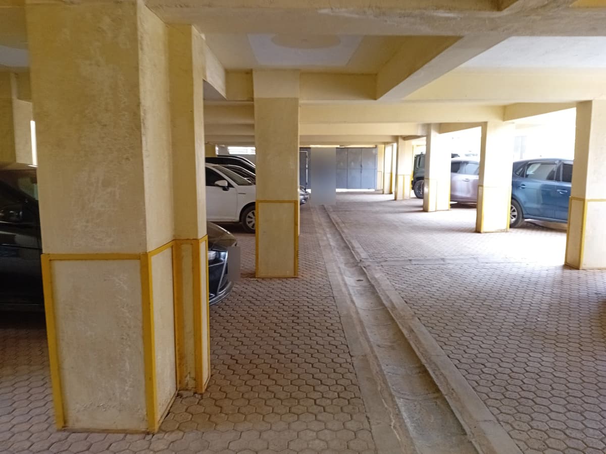 Underground covered parking garage with multiple bays