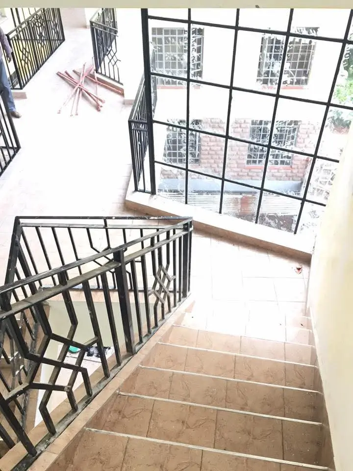 Spacious balcony with city views and modern railings