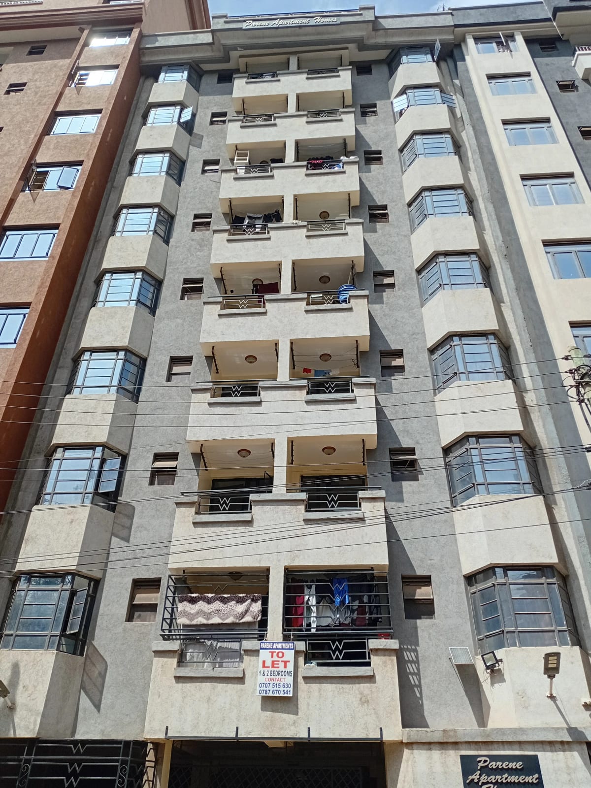 Multi-story residential building facade with balconies