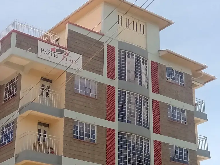 Multi-story residential building with balconies and modern facade