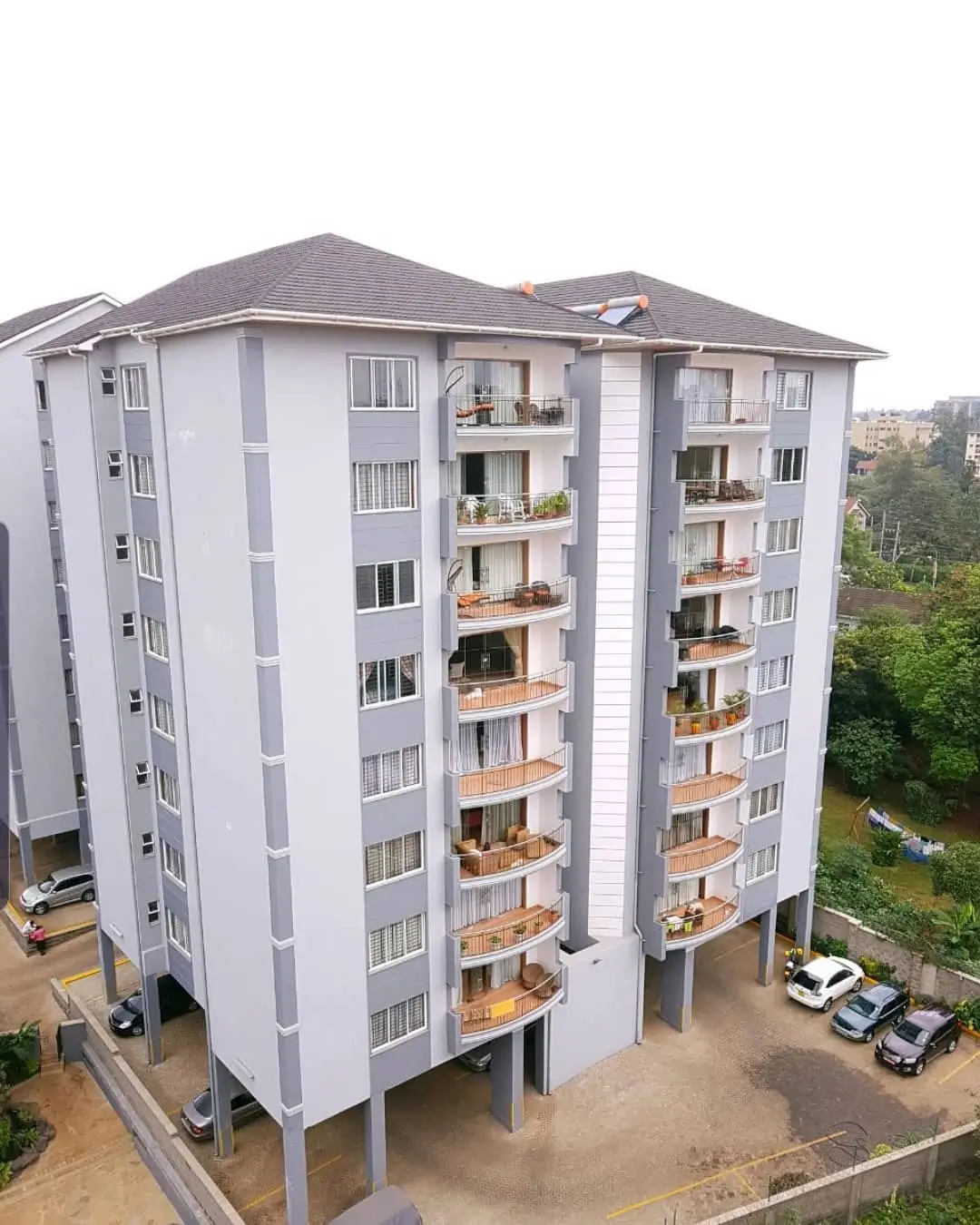 Modern multi-story residential apartment building with balconies