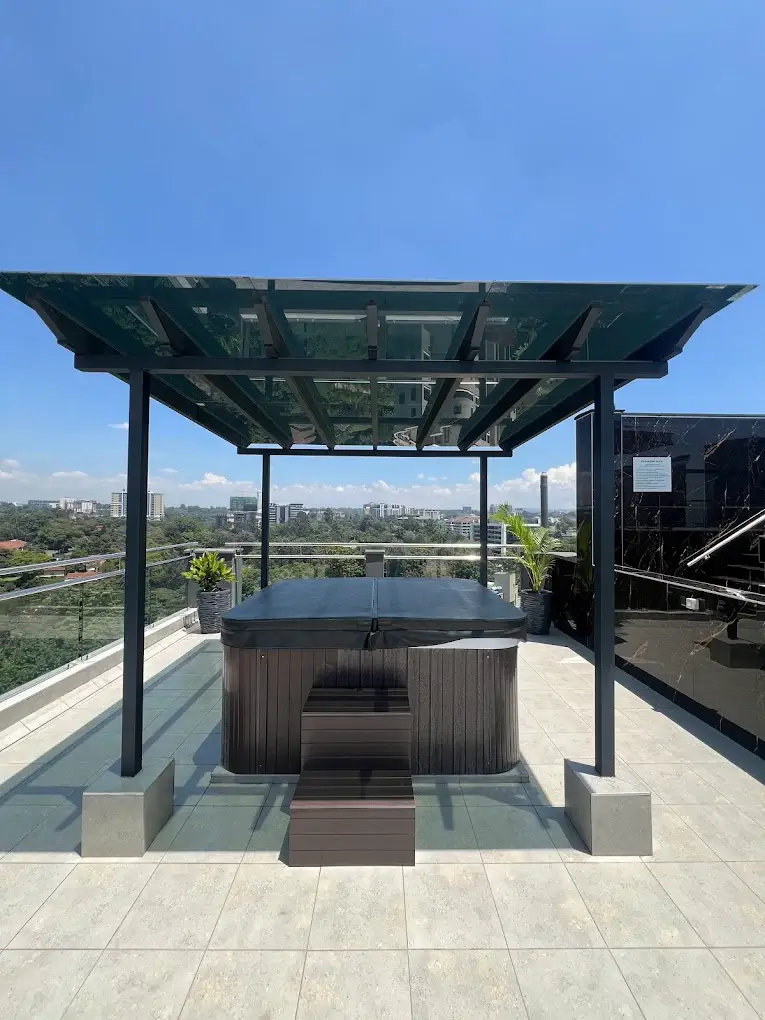 Rooftop terrace with hot tub and city views