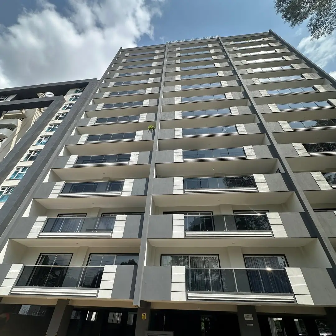 Modern multi-story residential building facade with balconies